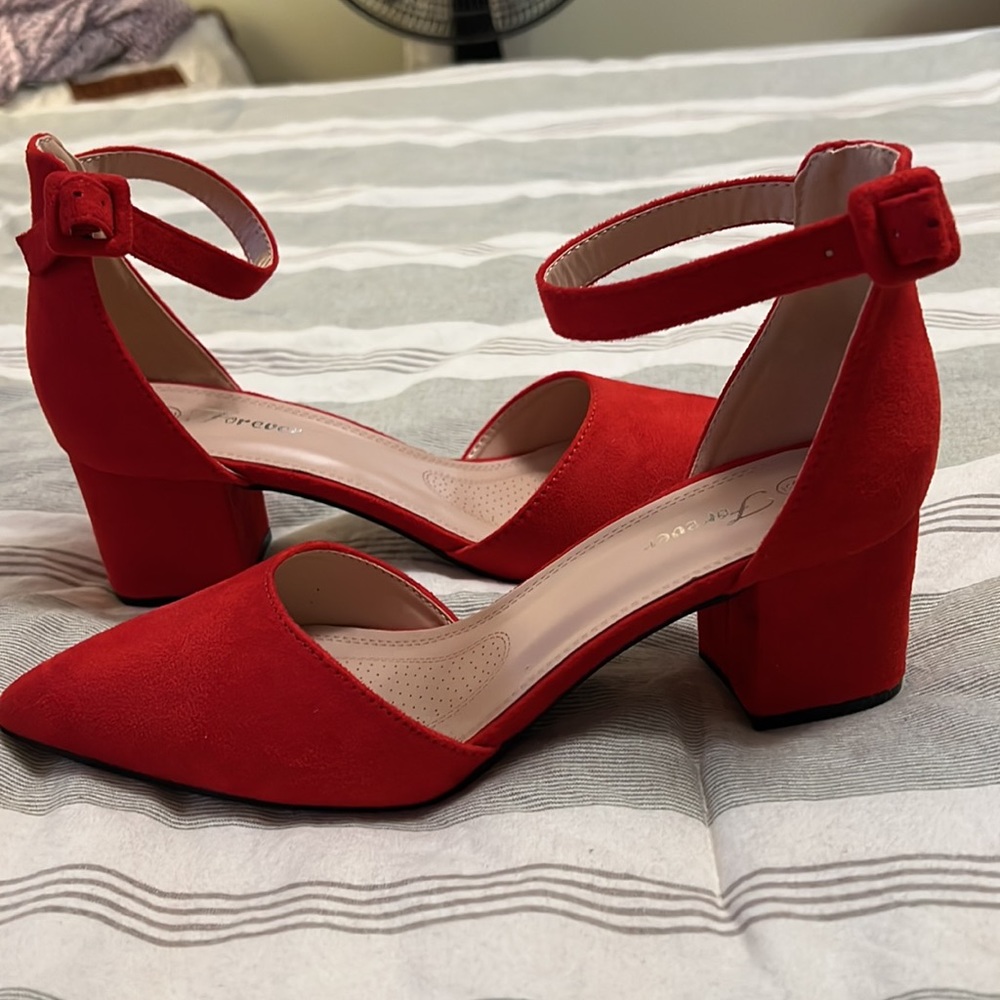 Size 9 red velvet shoes with approximate 2 inch heel.